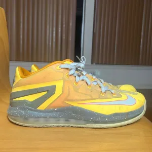 2014 Nike basketball LeBron shoes, yellow, size 11.5 in men’s, good condition,