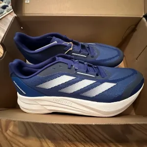 Adidas Duramo speed men's size 11 M blue and white sneaker tennis shoes