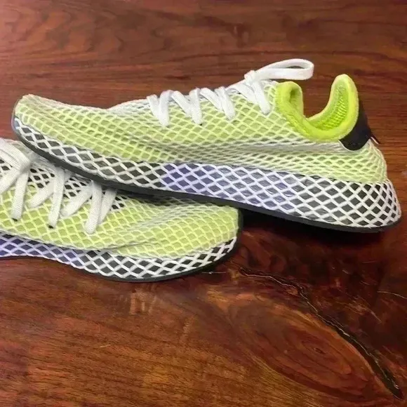 Adidas tennis shoes. Size men’s seven. Super cool!