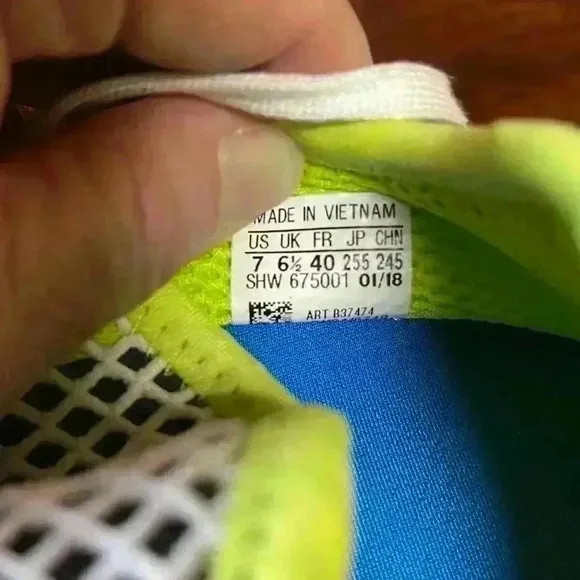 Adidas tennis shoes. Size men’s seven. Super cool!