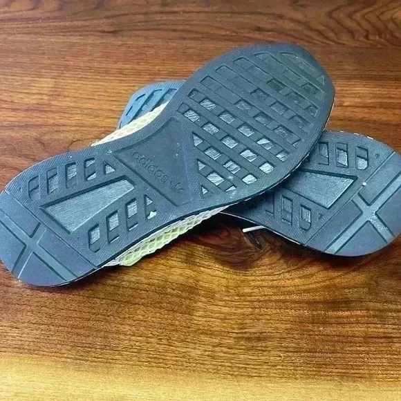 Adidas tennis shoes. Size men’s seven. Super cool!