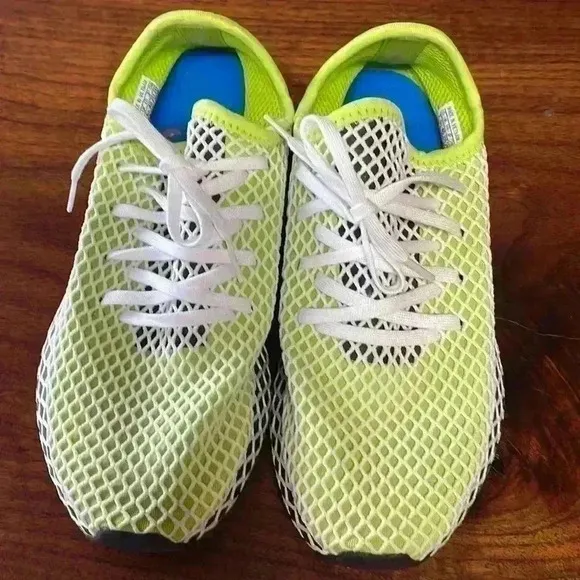 Adidas tennis shoes. Size men’s seven. Super cool!