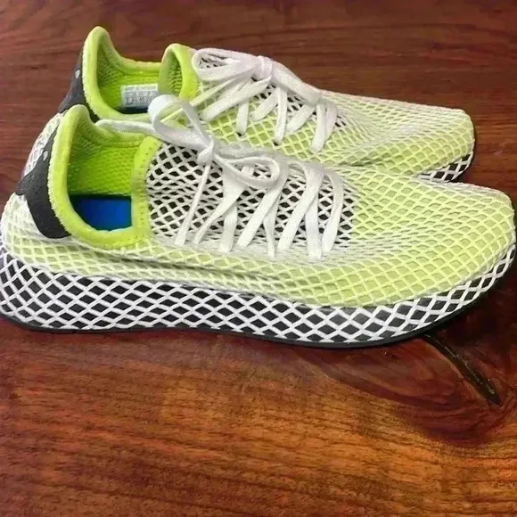 Adidas tennis shoes. Size men’s seven. Super cool!