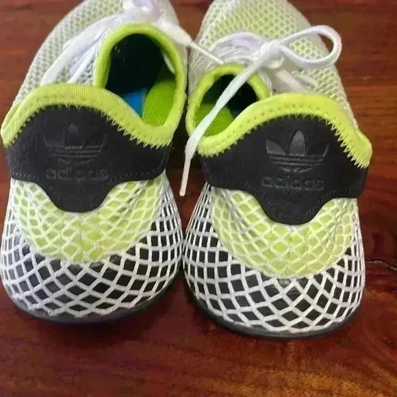 Adidas tennis shoes. Size men’s seven. Super cool!