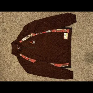 Air Jordan Men’s Masion Château Rouge Woven Jacket