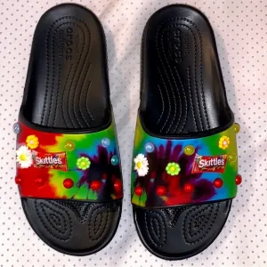 Crocs multicolor, slides with skittles, flowers shoe charms sz Women’s 7/Men’s 5