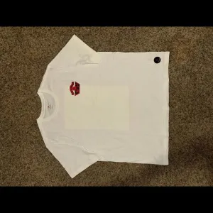 Jordan Men’s Nina Chanel Abney White T-shirt Sample