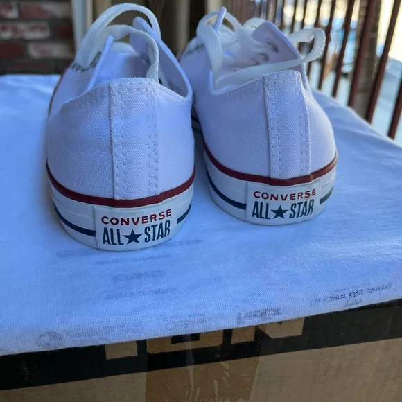 Man and woman, converse sneaker shoes. Men’s size 7, women’s size