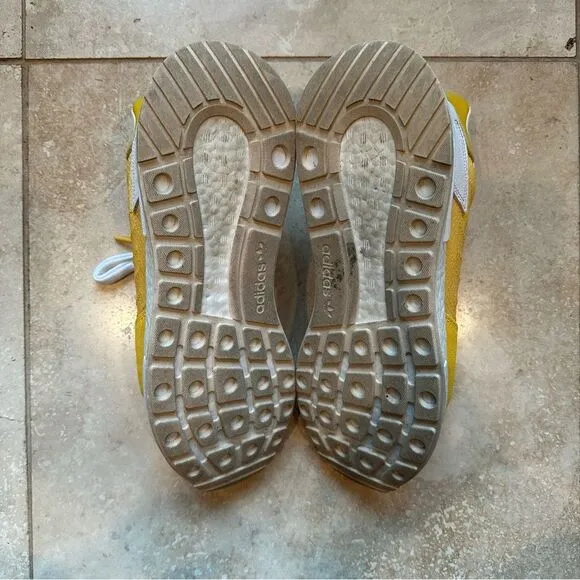 Men’s Adidas ZX 500 RM shoes in yellow.