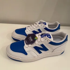 New Balance 480 Unisex Shoes Size:,Men’s 9 Women’s 10.5 Color: White/Blue