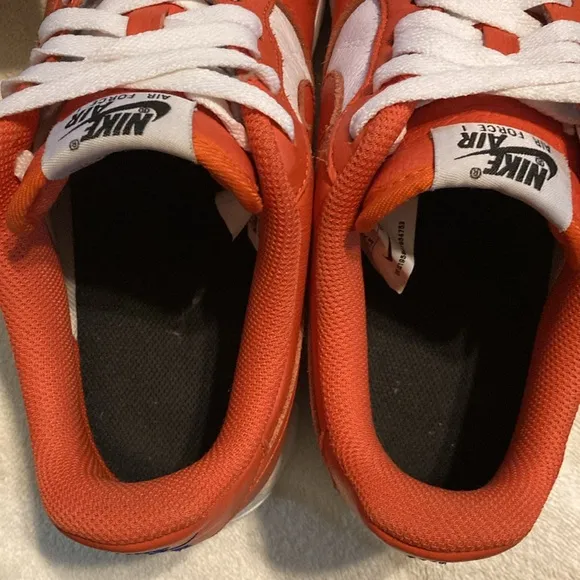 Nike Air Force1 orange and white shoes. Size men’s 8/1/2.