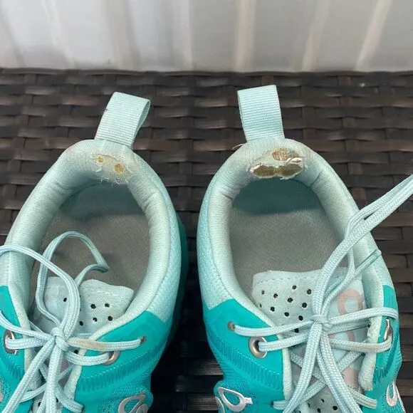 On cloud sneakers, women’s size 8