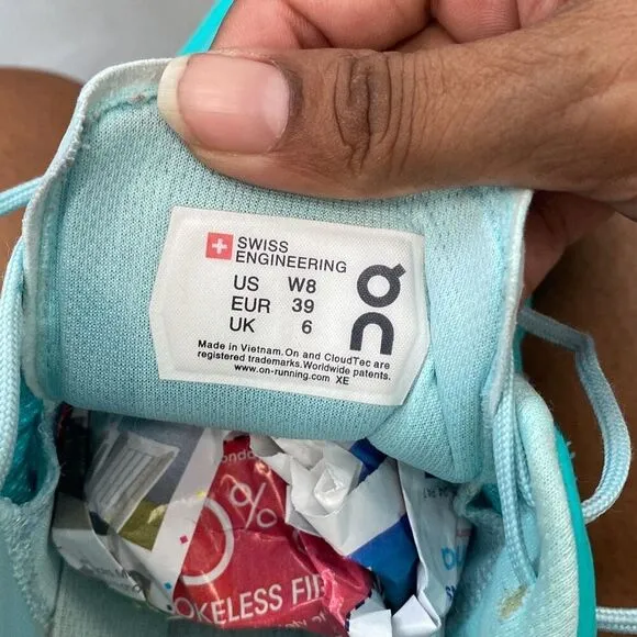 On cloud sneakers, women’s size 8