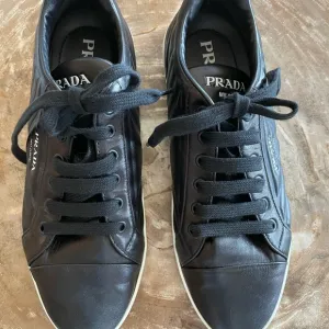 Prada Women’s Black Leather Sneakers