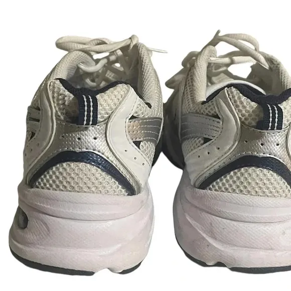 Size 7.5 Men’s New Balance color White silver sneaker WL574G02. Shoes