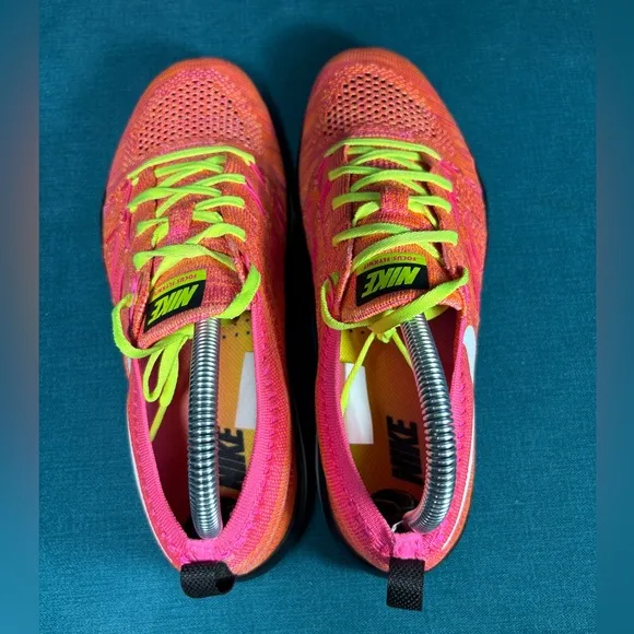 Size 8.5 - Women’s Nike Focus Flyknit multicolor shoes