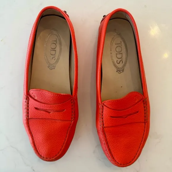 Tod’s Women’s Gommino Driving Shoes in Orange. Size 38EU/8US
