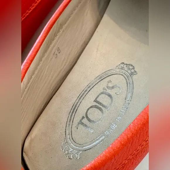 Tod’s Women’s Gommino Driving Shoes in Orange. Size 38EU/8US