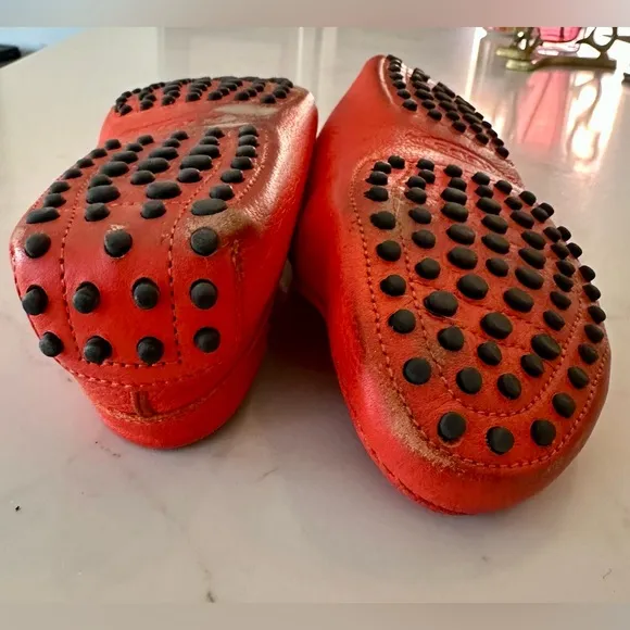Tod’s Women’s Gommino Driving Shoes in Orange. Size 38EU/8US