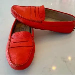 Tod’s Women’s Gommino Driving Shoes in Orange. Size 38EU/8US