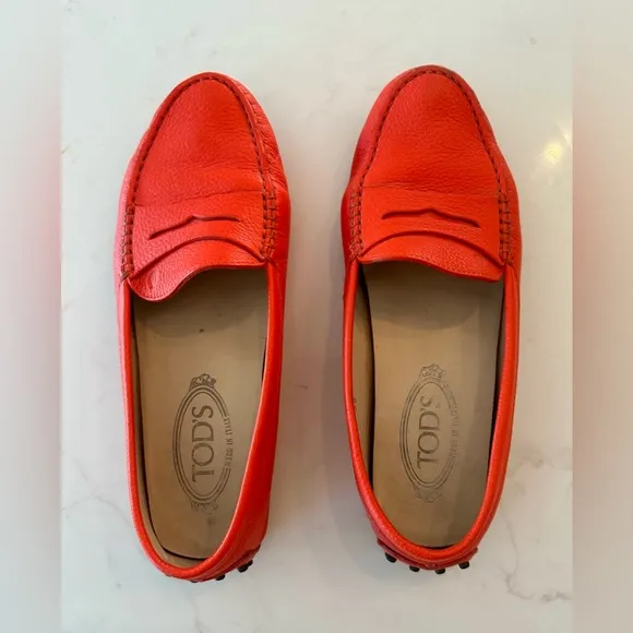 Tod’s Women’s Gommino Driving Shoes in Orange. Size 38EU/8US