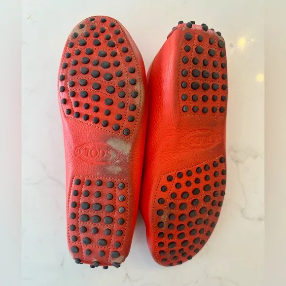 Tod’s Women’s Gommino Driving Shoes in Orange. Size 38EU/8US