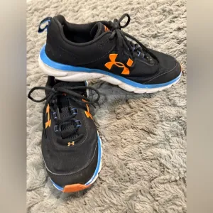 Under Armour Charged Assert Men’s Black Shoes. Size 9.