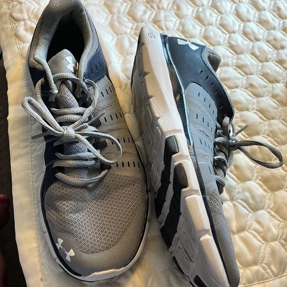 Under Armour Women’s basketball shoes, size 12 women, hardly worn.