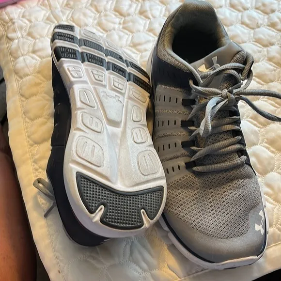Under Armour Women’s basketball shoes, size 12 women, hardly worn.
