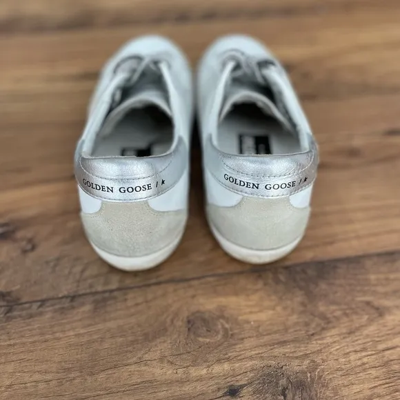 Women’s Golden Goose Super-Star with silver heel and metal stud lettering size40