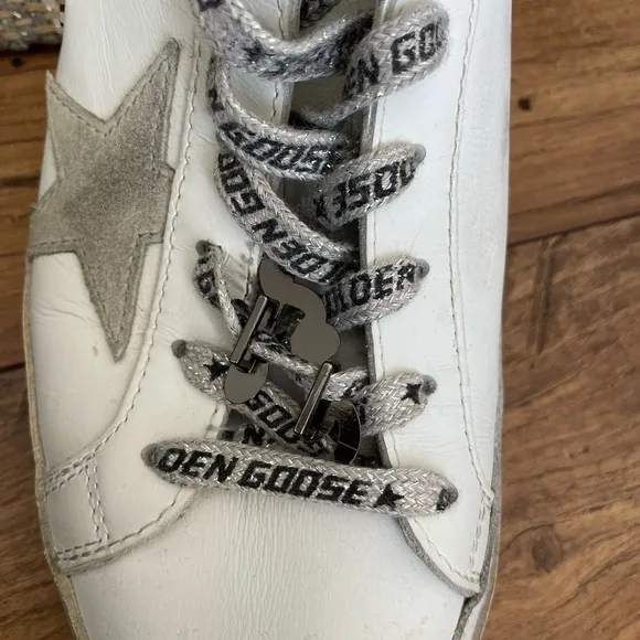 Women’s Golden Goose Super-Star with silver heel and metal stud lettering size40