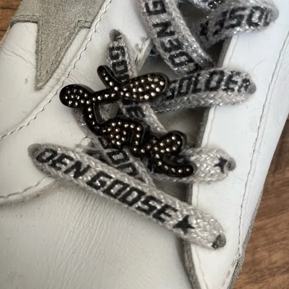 Women’s Golden Goose Super-Star with silver heel and metal stud lettering size40