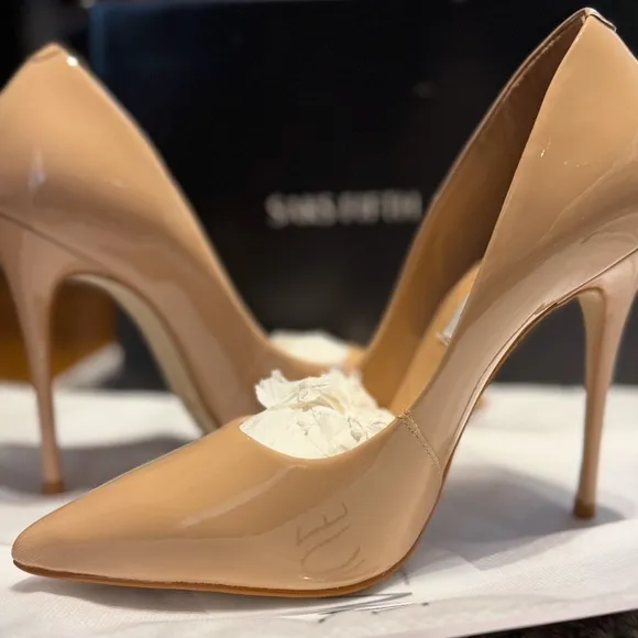 Women’s gorgeous shoes by Saks Fifth Ave.