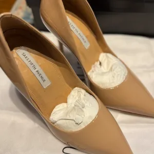 Women’s gorgeous shoes by Saks Fifth Ave.